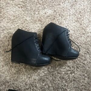 Black wedge booties